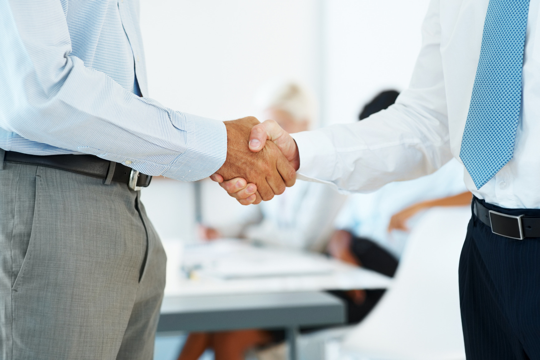 photodune-645934-handshake-of-business-partners-after-striking-deal-m